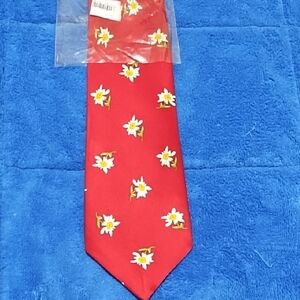 NWT Silk Necktie with white edelweiss flowers & green leaves on a red background